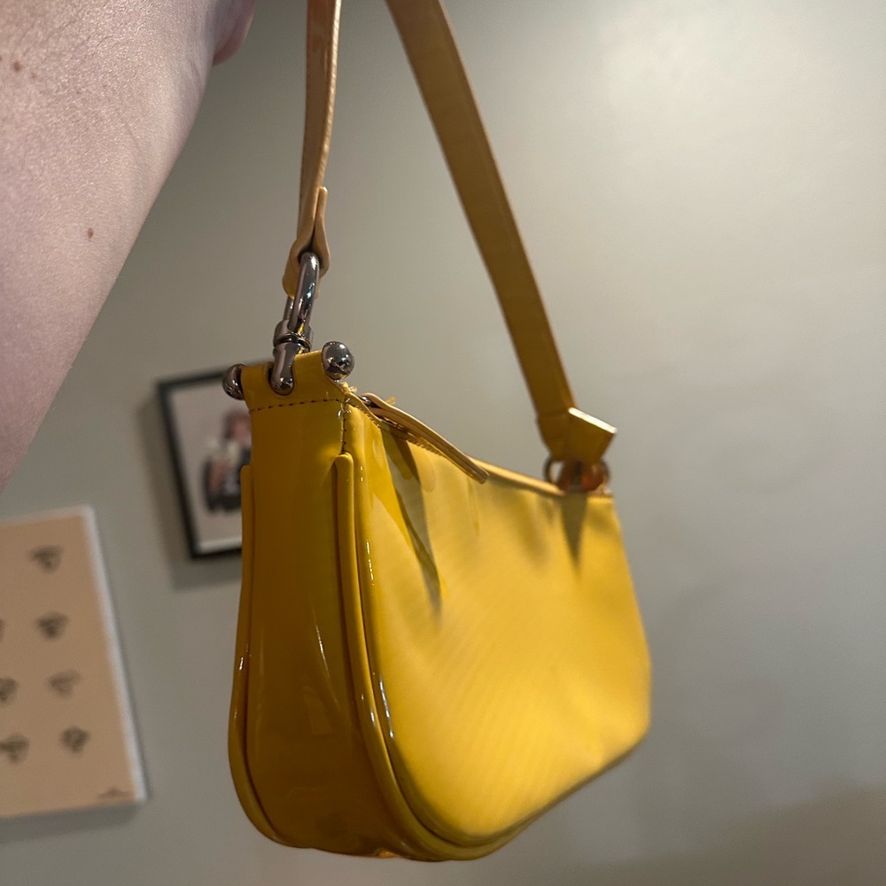 Like new urban outfitters yellow baguette bag!